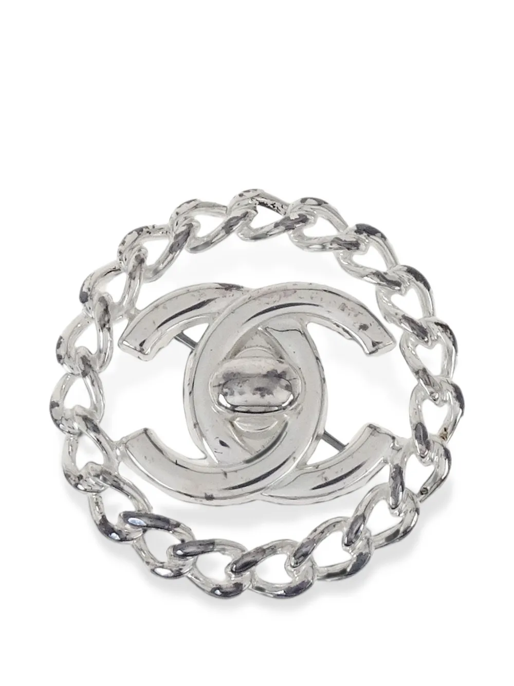 CHANEL Pre-Owned CC Turnlock chain brooch – Silver