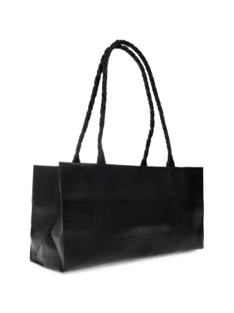 Issey Miyake logo-debossed twisted-handle shoulder bag