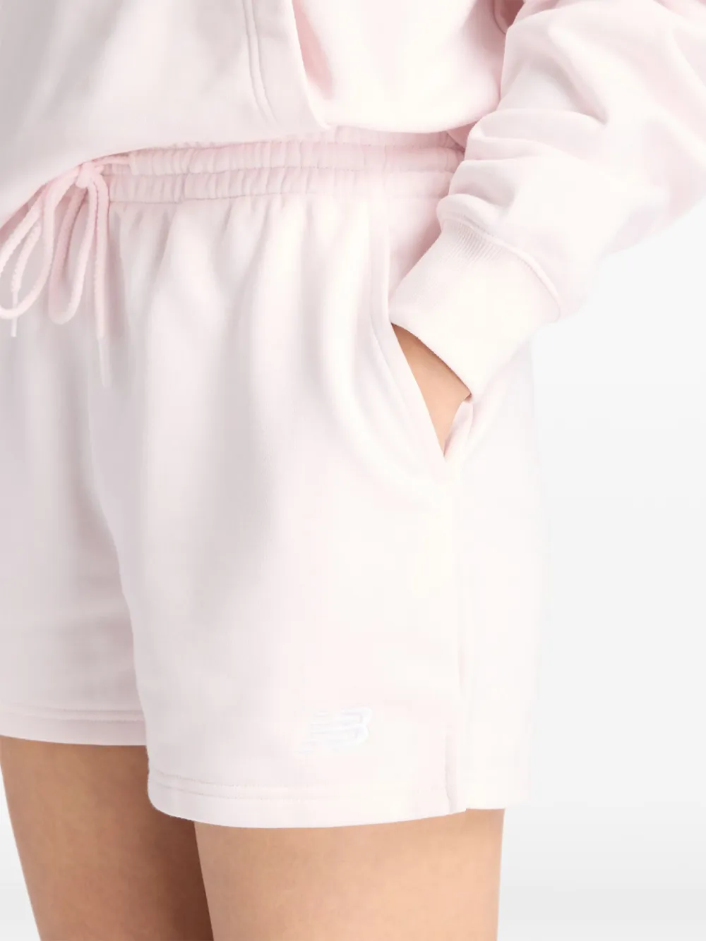 New Balance Sport Essentials badstof shorts Roze