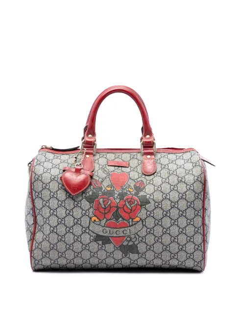 Gucci Pre-Owned 2016-2026 mittelgroße GG Supreme Joy Boston Tasche mit Tattoo-Herz