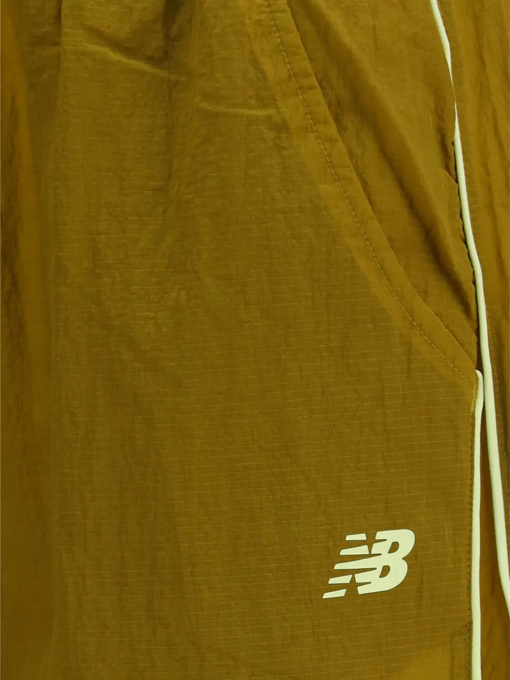 New Balance Sport Legacy track pants Groen