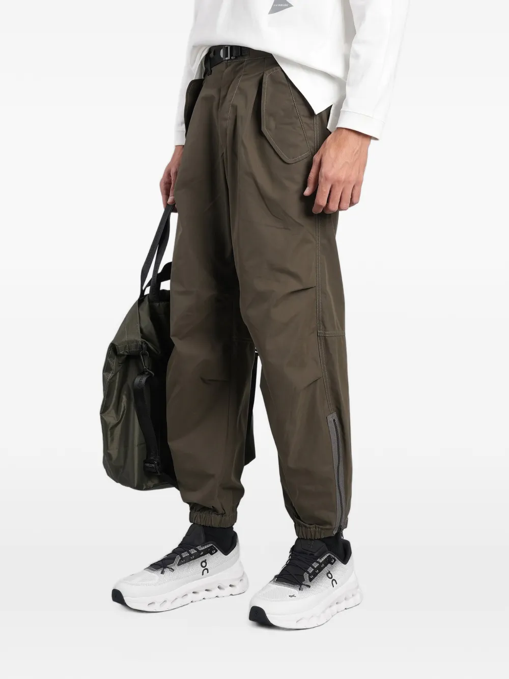 and Wander belted zip-cuff trousers Groen