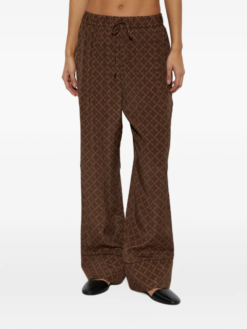 By Malene Birger Martha monogram-print trousers Bruin