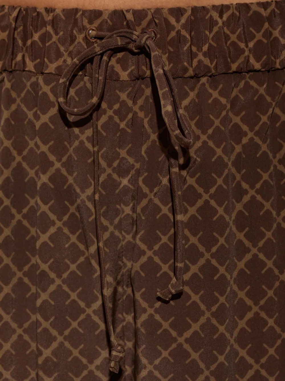 By Malene Birger Martha monogram-print trousers Bruin