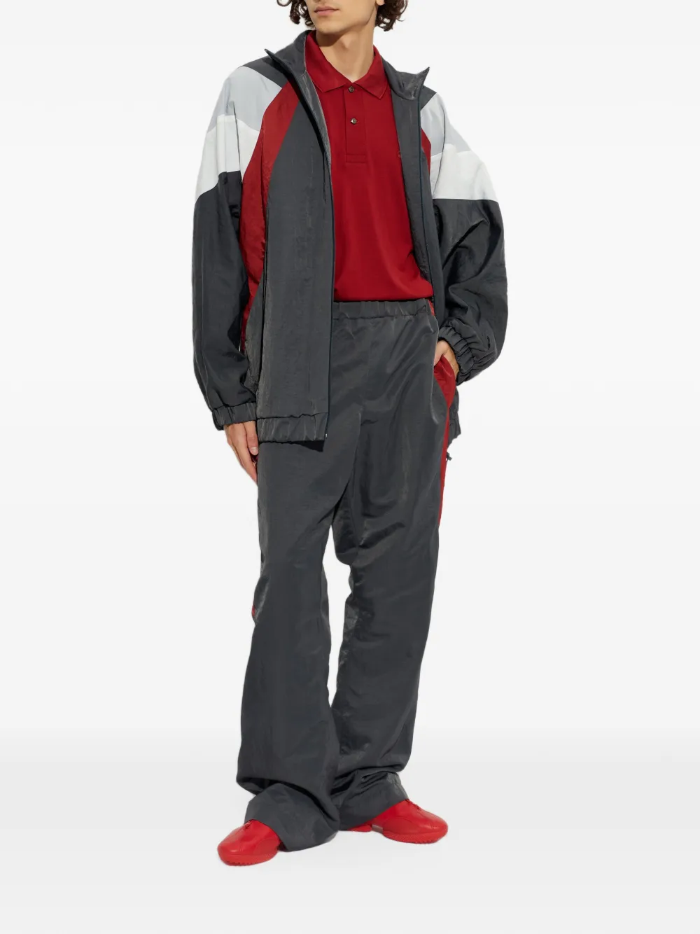 Lacoste Runway ruimvallende joggingbroek met streepdetail Grijs