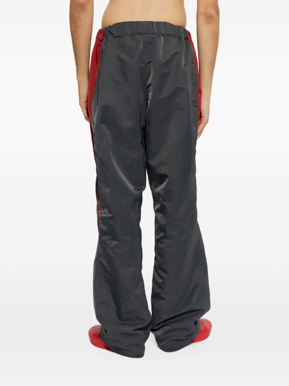 Lacoste Runway ruimvallende joggingbroek met streepdetail Grijs