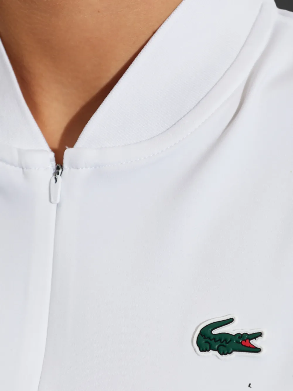 Lacoste sleeveless stretch dual fabric tennis polo shirt Wit