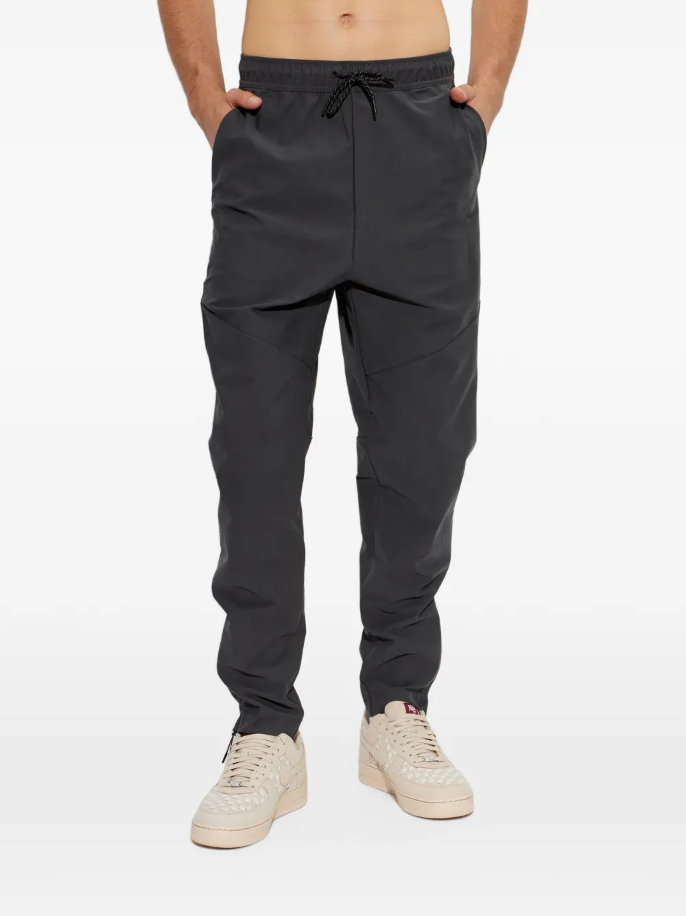 Nike drawstring-waist wide-leg trousers Grijs