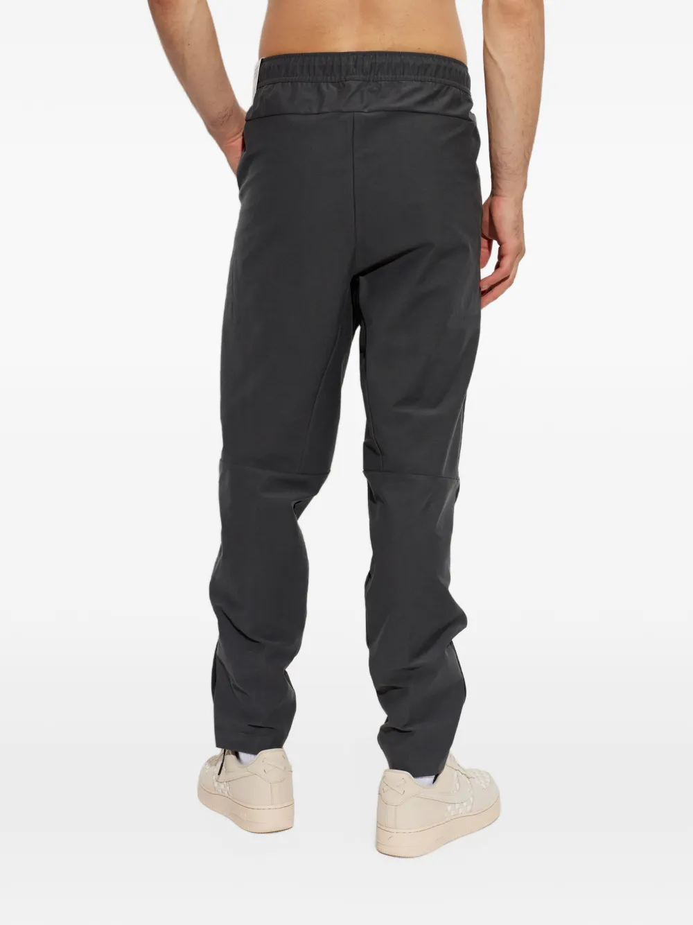 Nike drawstring-waist wide-leg trousers Grijs