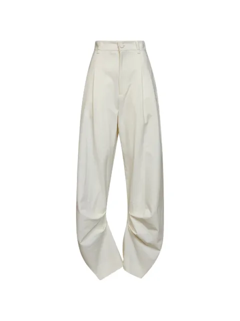 Amen pleated curved-leg trousers