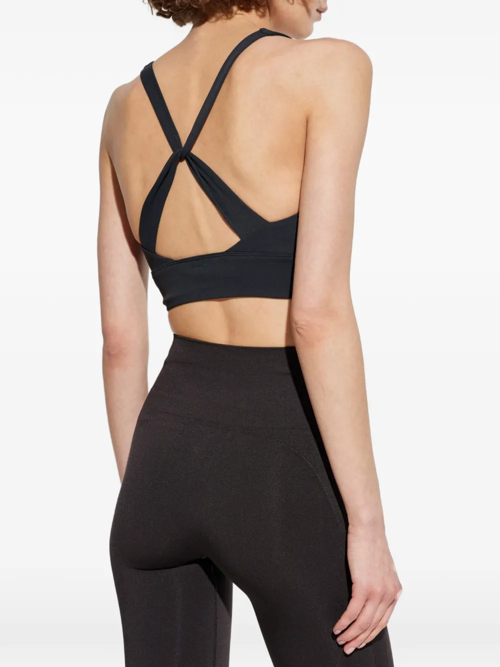 RETHINKIT STUDIOS Sienna crossover-strap training top Zwart