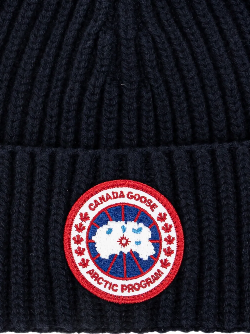 Canada Goose logo-patch ribbed-knit beanie hat Blauw