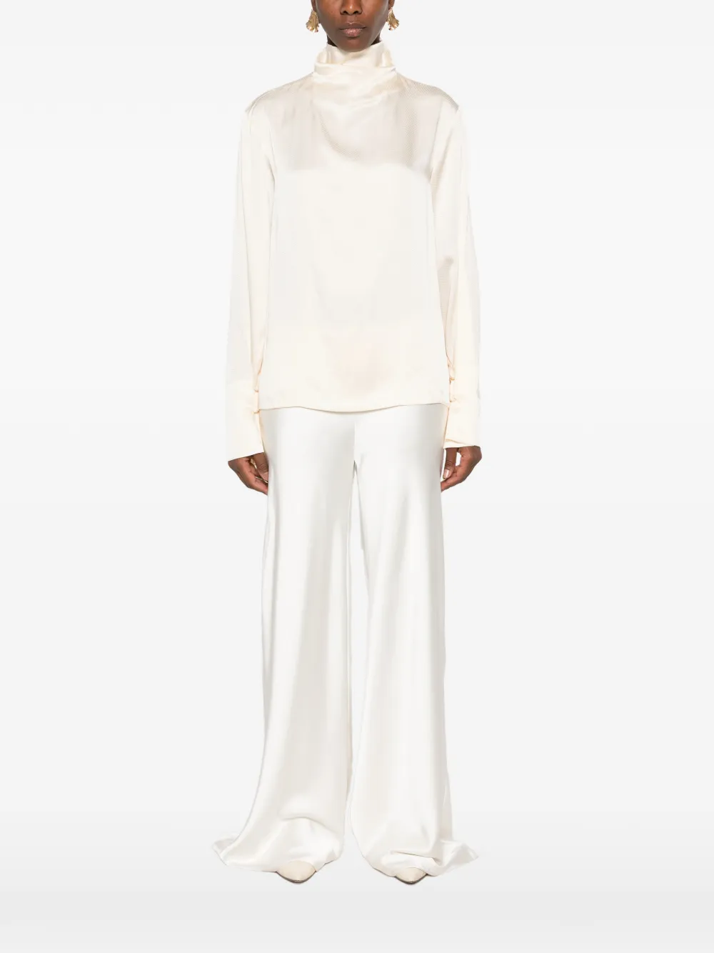 THE ANDAMANE Blouse met open achterkant en hoge hals Beige