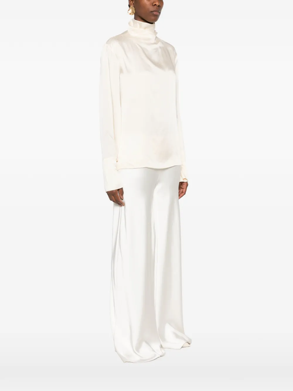 THE ANDAMANE Blouse met open achterkant en hoge hals Beige