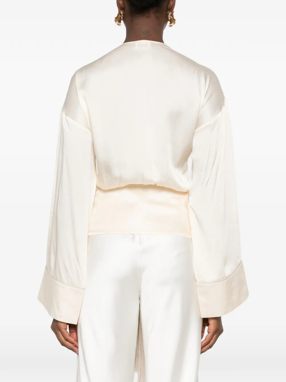 THE ANDAMANE fringe-trim tie-front blouse Beige