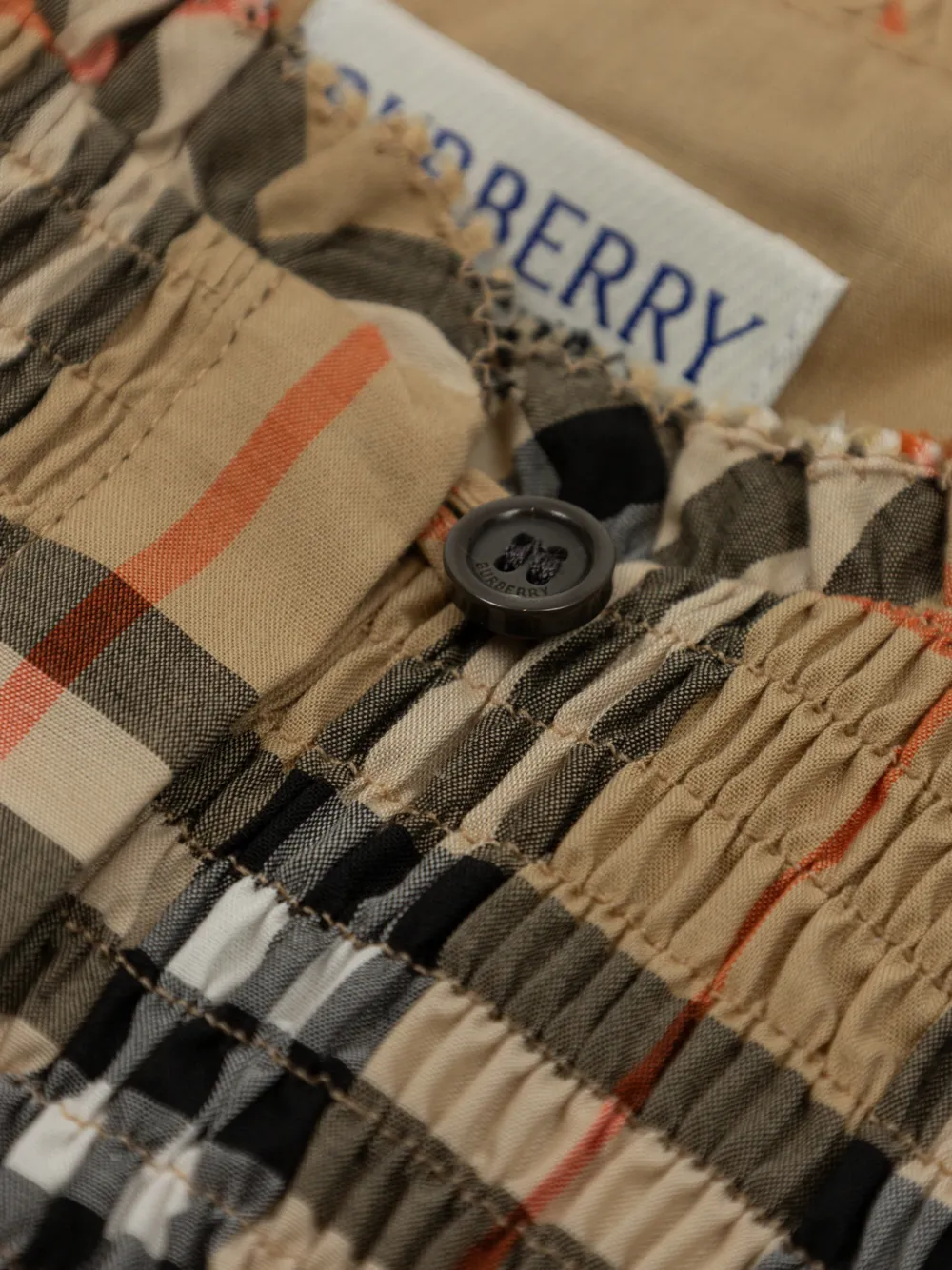 Burberry Kids Gesmockte jurk met geruite print Beige
