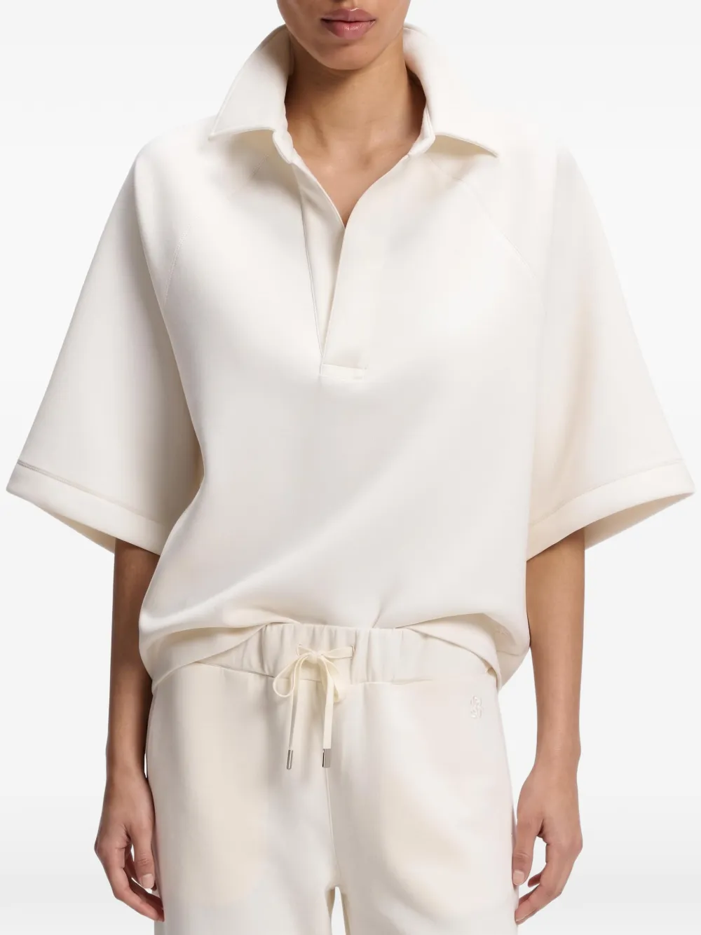 BOSS loose-fit polo sweatshirt in scuba-jersey Beige