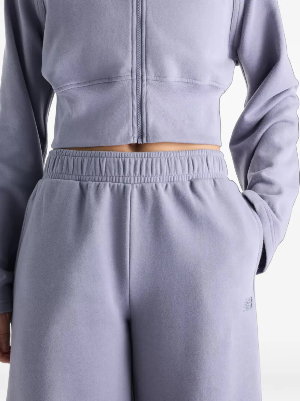 New Balance brushed Coastal fleece pants Blauw