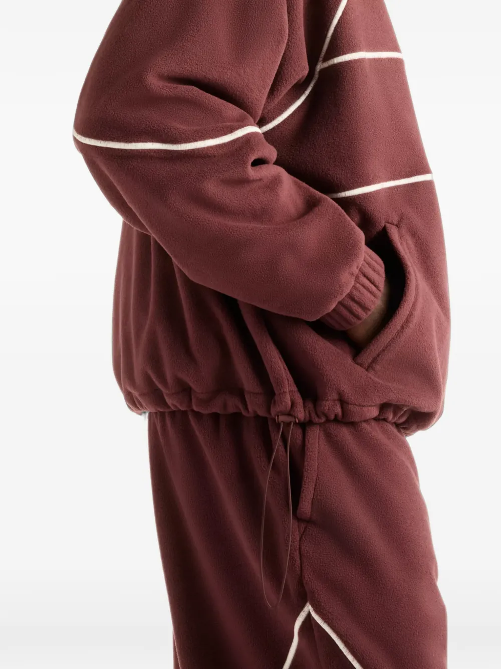 New Balance Trackside polar fleece hoodie Rood
