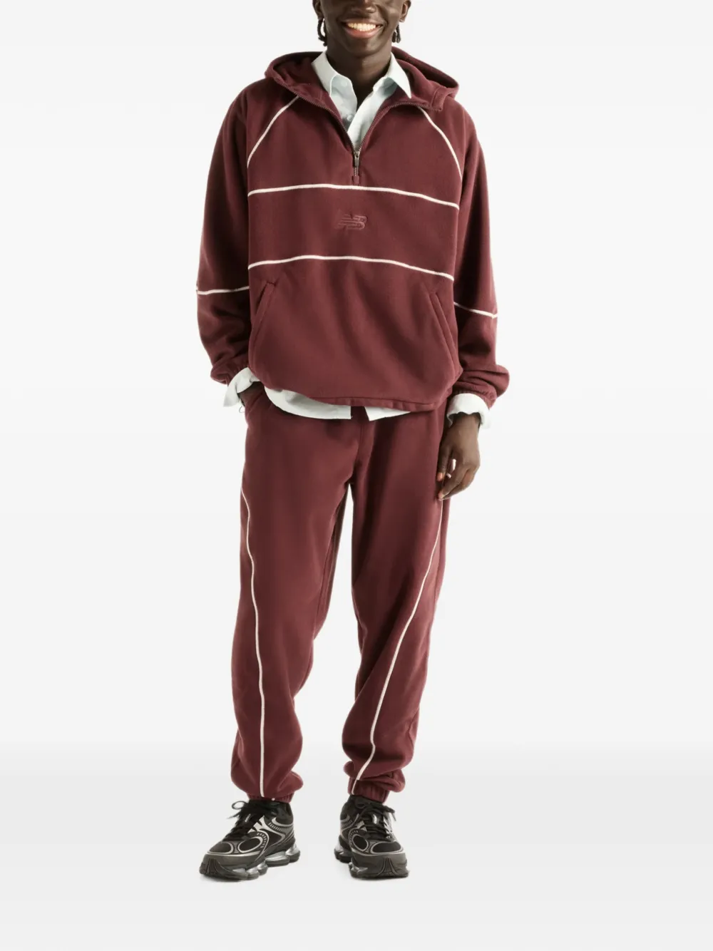 New Balance Trackside polar fleece hoodie Rood