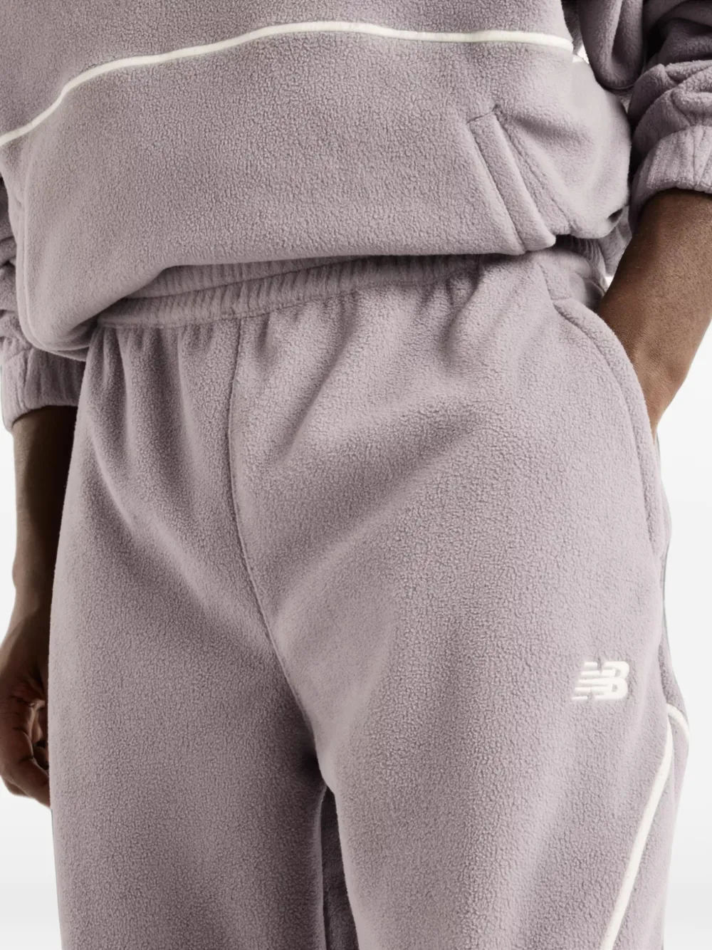 New Balance Trackside polar fleece joggers Zwart