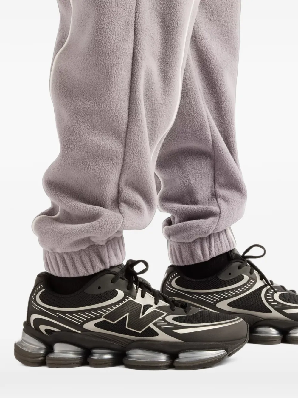 New Balance Trackside polar fleece joggers Zwart