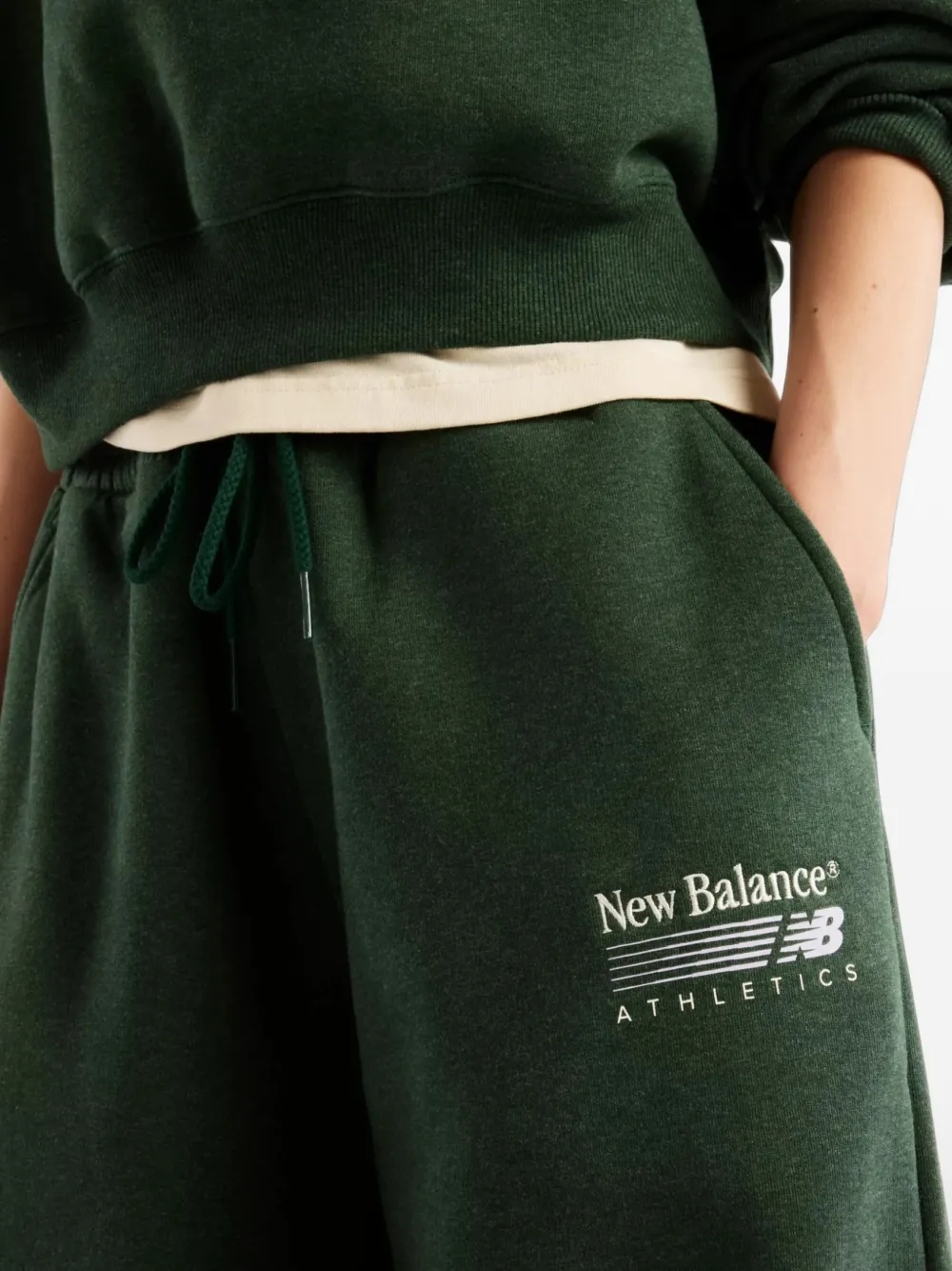 New Balance Trackside fleece pants Groen