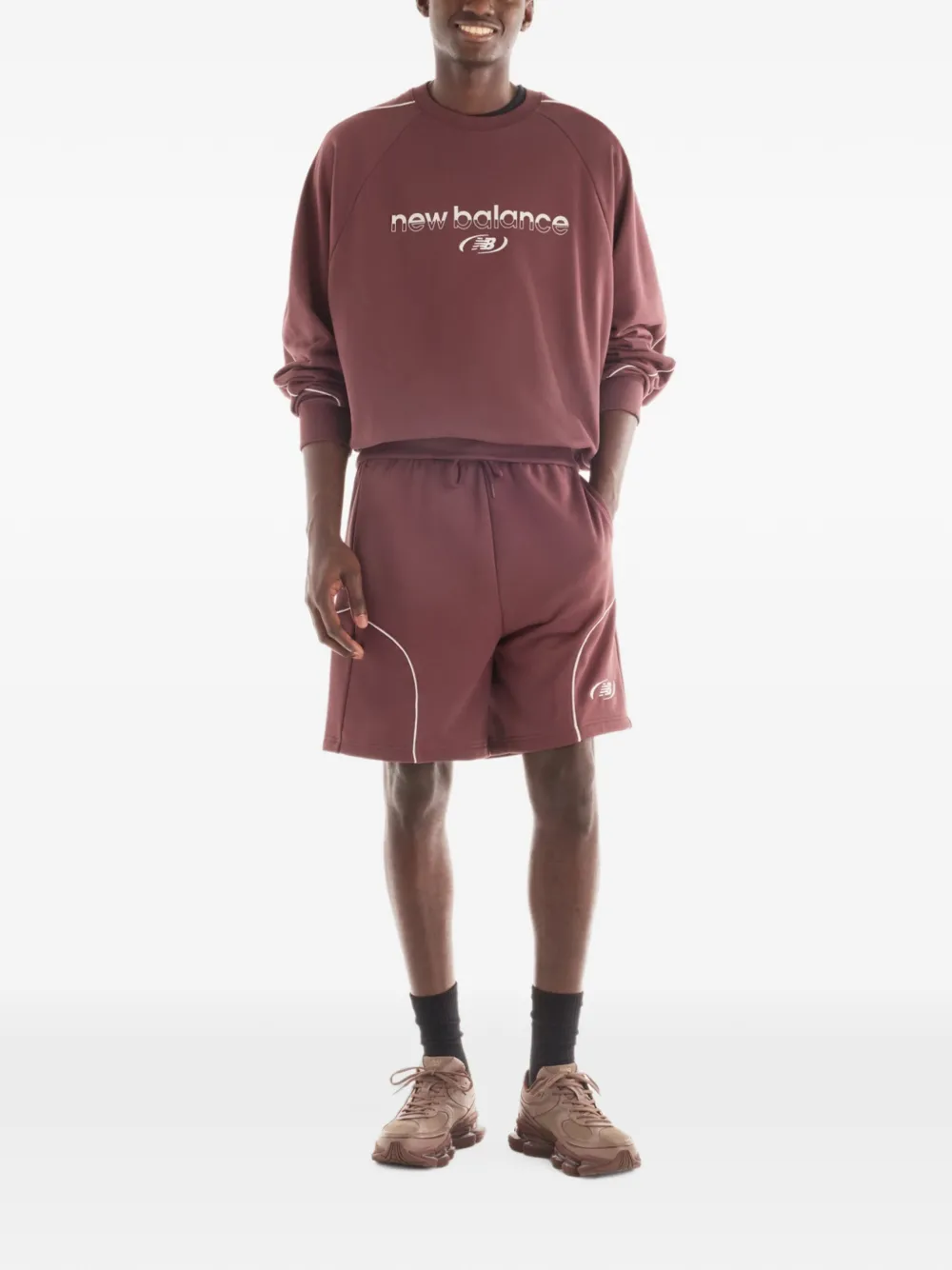 New Balance Trackside French terry crew Rood