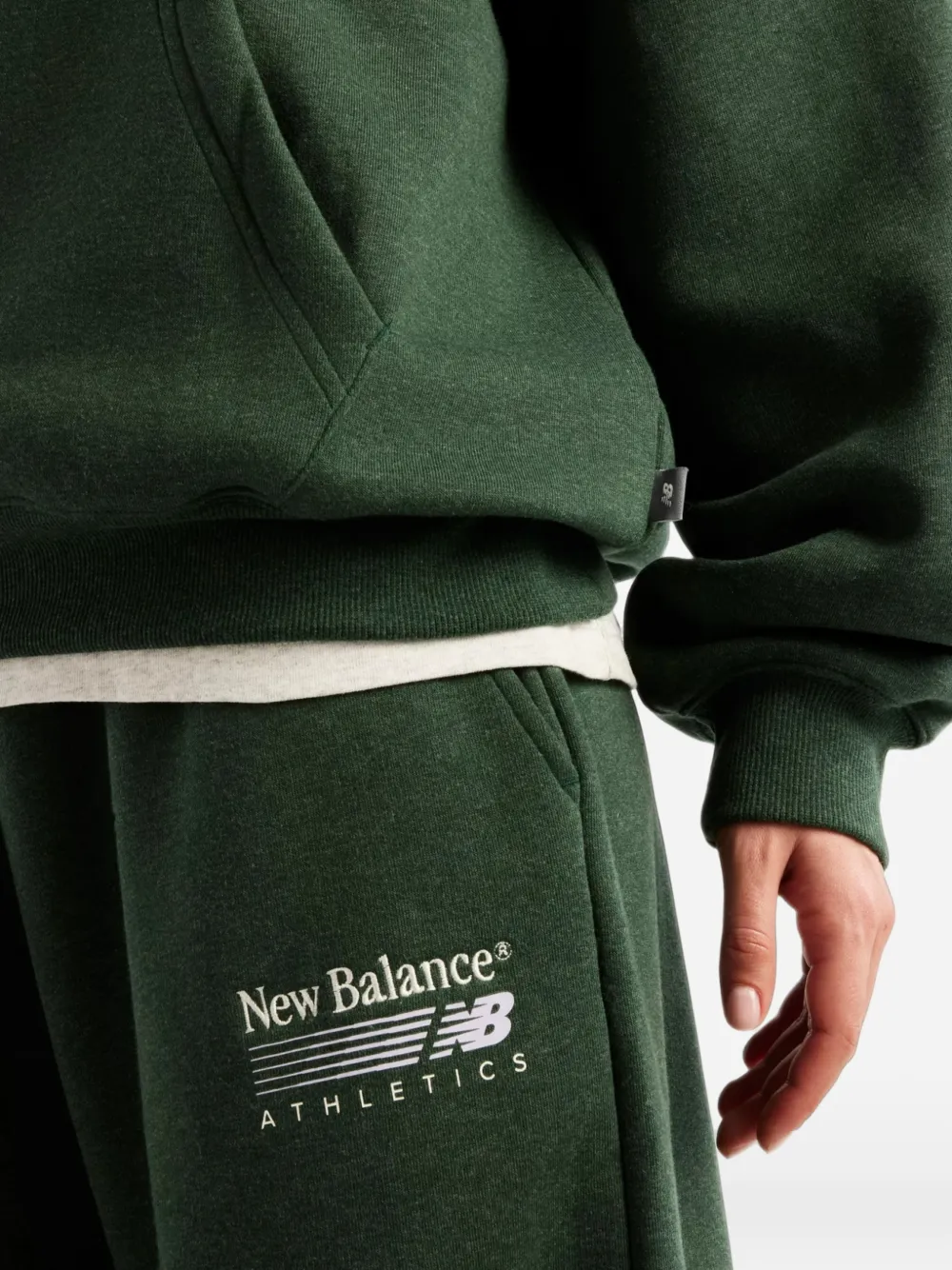 New Balance Trackside fleece hoodie Groen