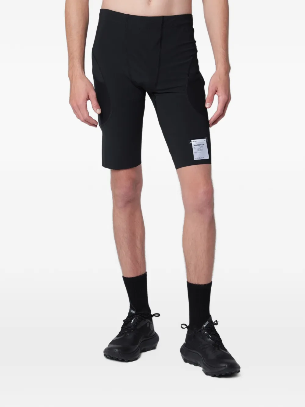 Satisfy logo-patch panelled shorts - Schwarz