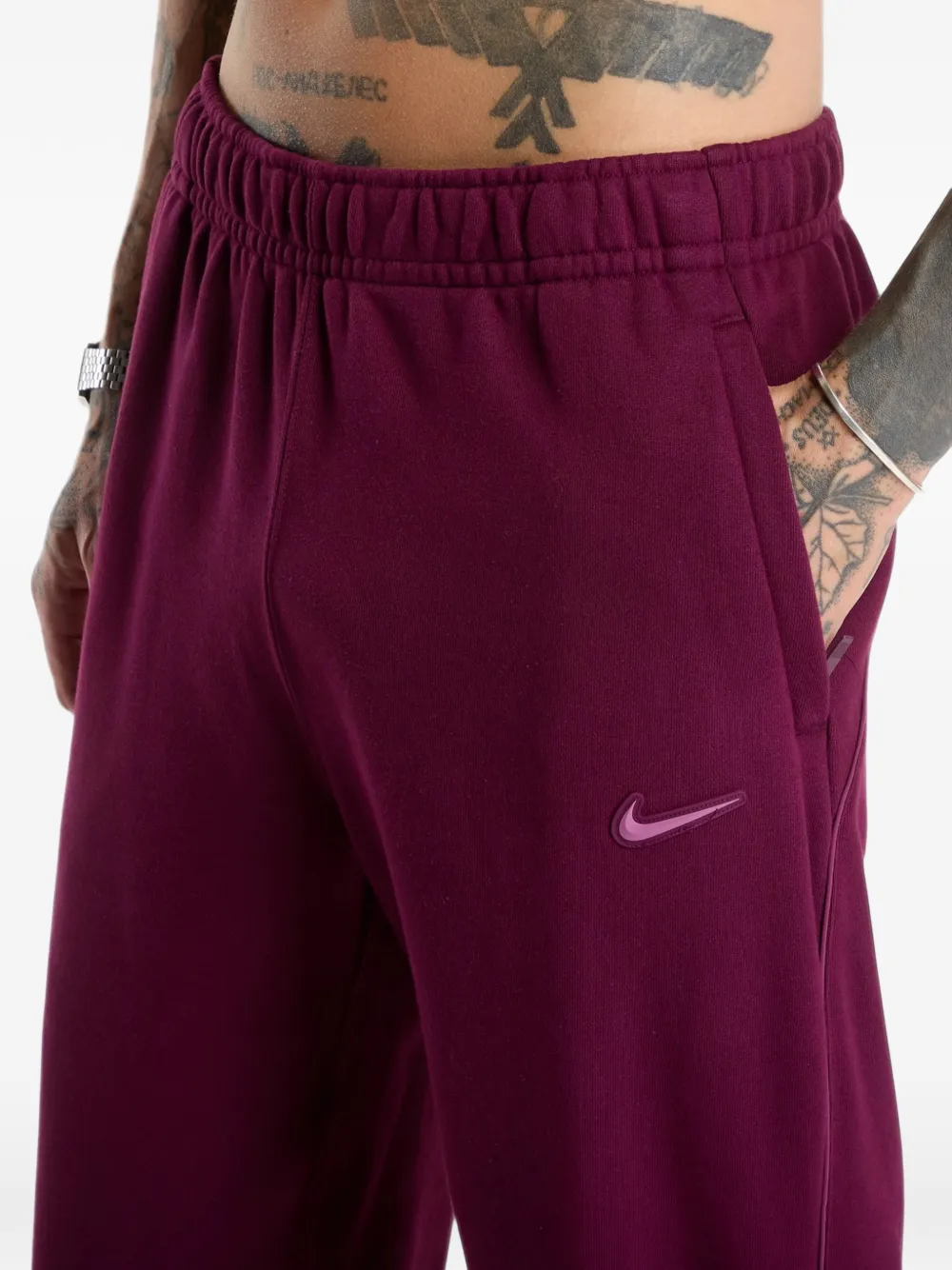 Nike Nocta logo-patch track pants Rood