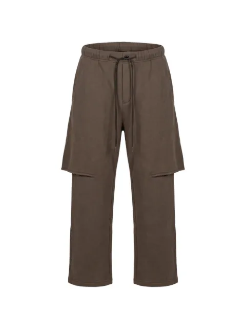 sacai pantalones con detalle de capas y cordón