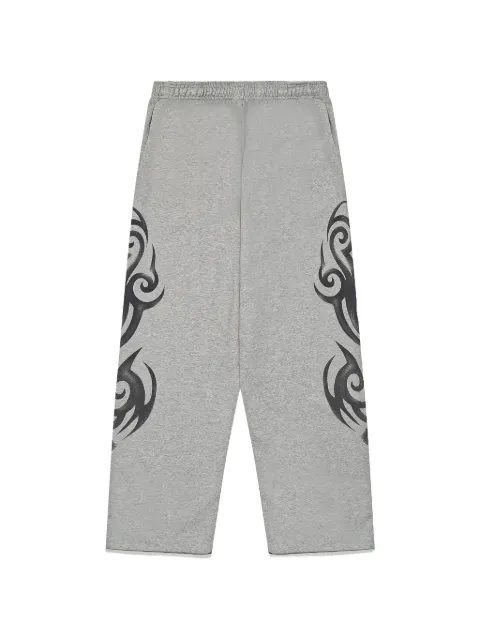 VETEMENTS graffiti-print track pants