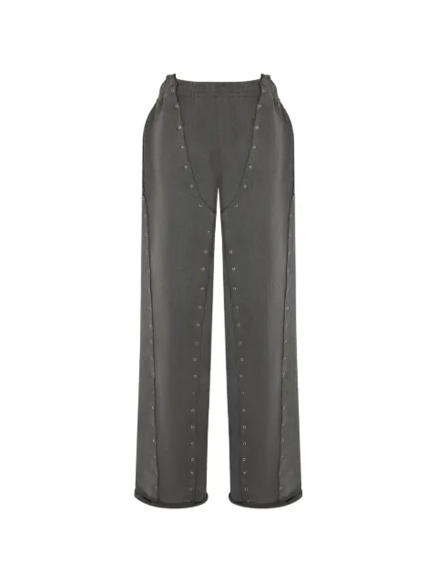 SRVC Studio eyelet-embellished raw-edge track pants