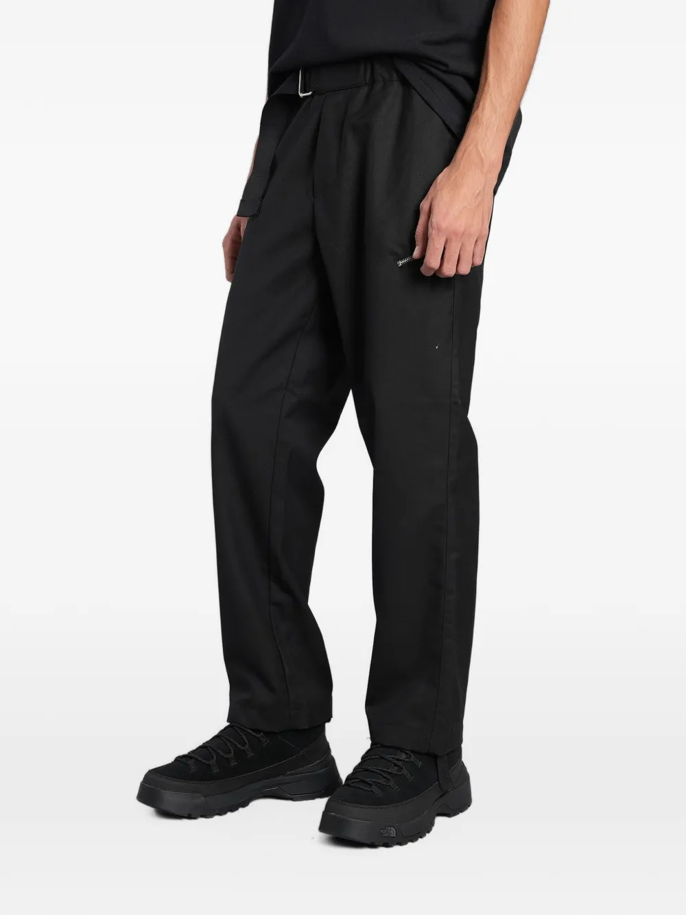 Peacemaker Oamc belted zip-detail trousers Zwart