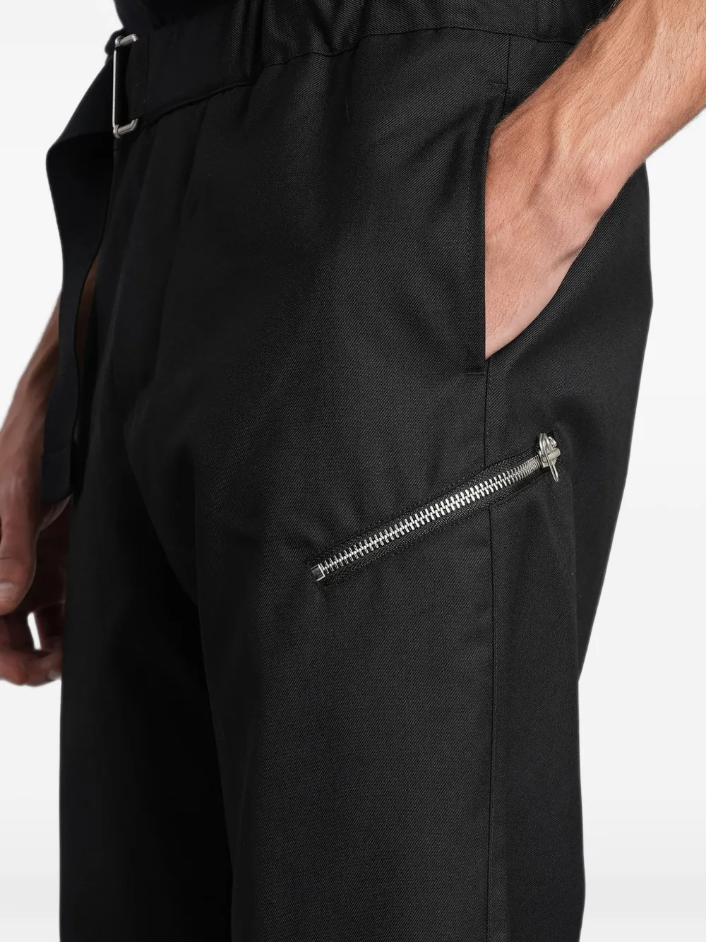 Peacemaker Oamc belted zip-detail trousers Zwart