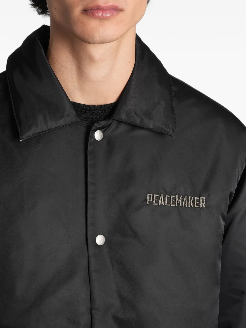 Peacemaker Oamc logo-embroidered padded jacket Zwart