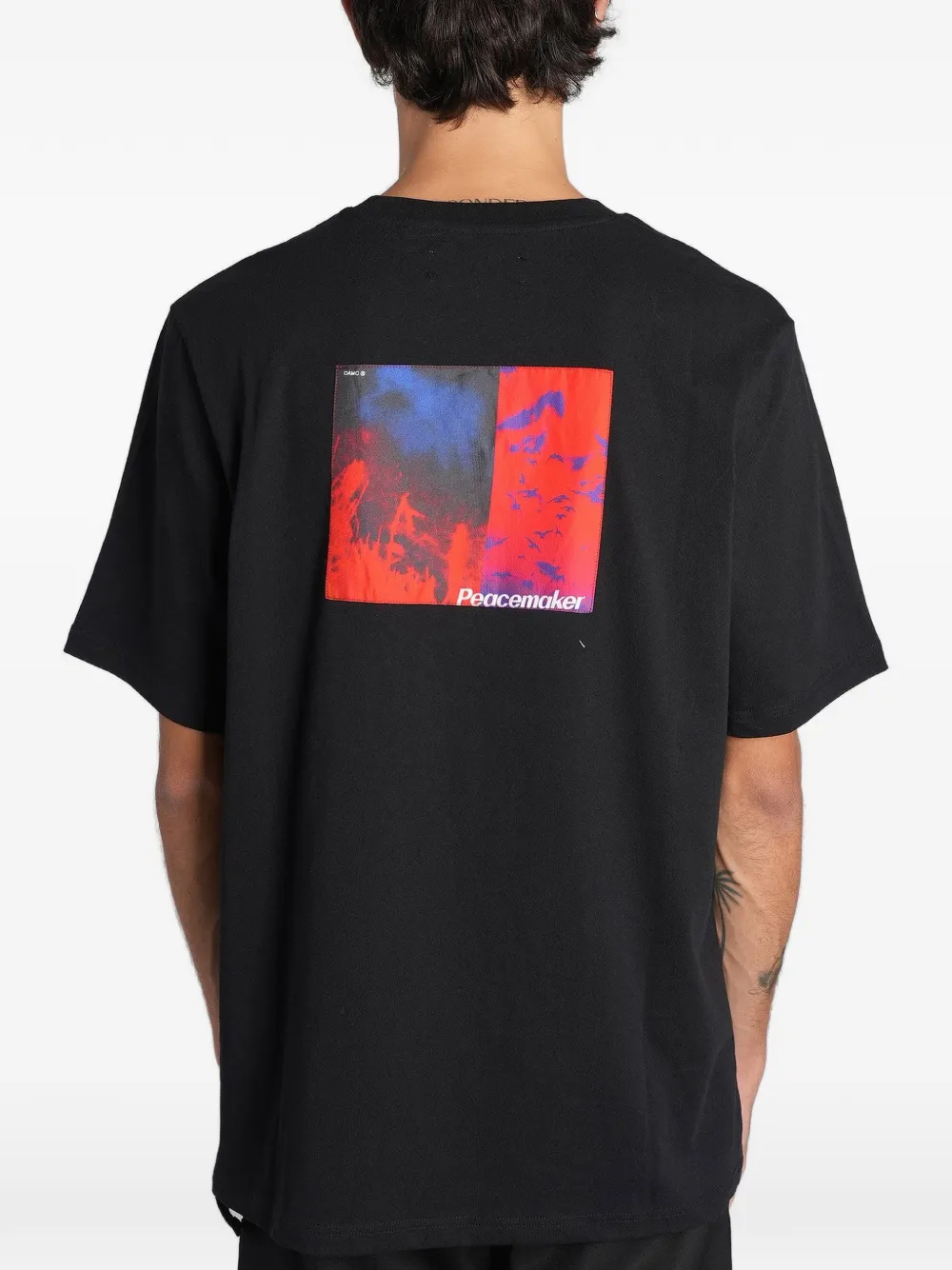 Peacemaker Oamc graphic-print cotton T-shirt Zwart