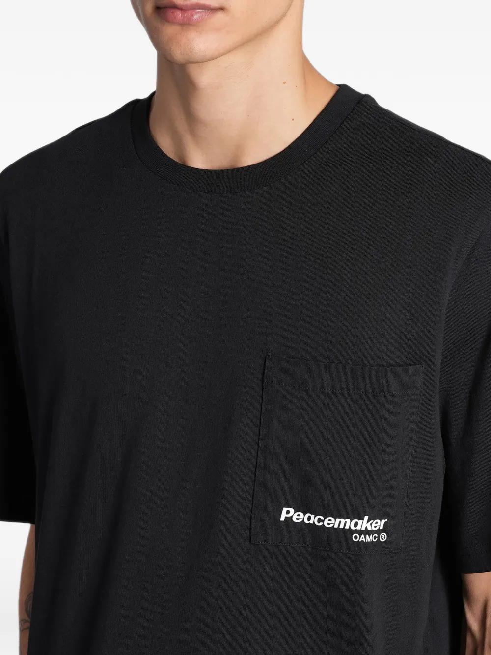 Peacemaker Oamc graphic-print cotton T-shirt Zwart