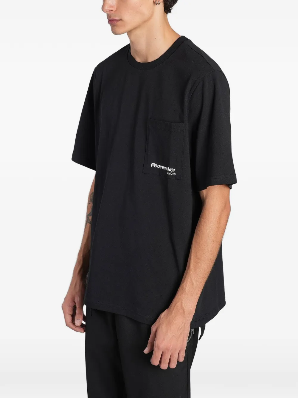 Peacemaker Oamc graphic-print cotton T-shirt Zwart