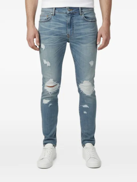 AMIRI distressed slim-fit jeans