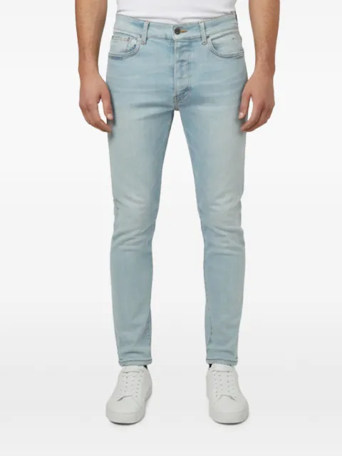 AMIRI faded skinny jeans
