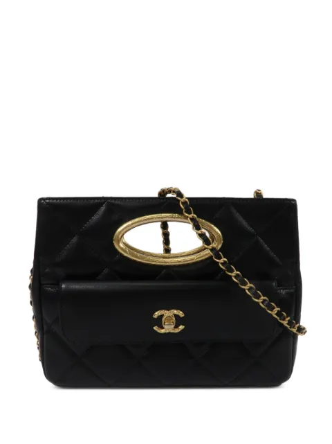 CHANEL Pre-Owned bolsa de mano con cierre giratorio y CC