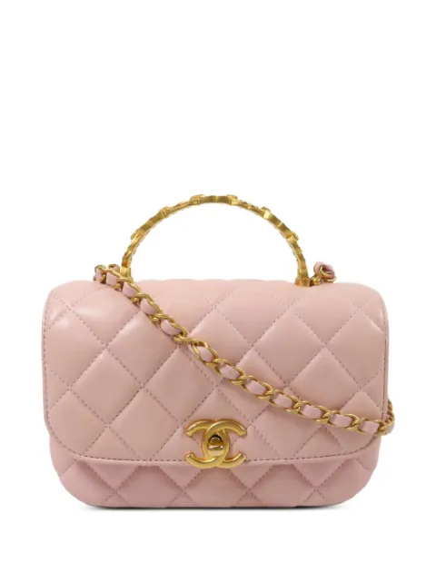 CHANEL Pre-Owned tote capitonado mini con cierre giratorio