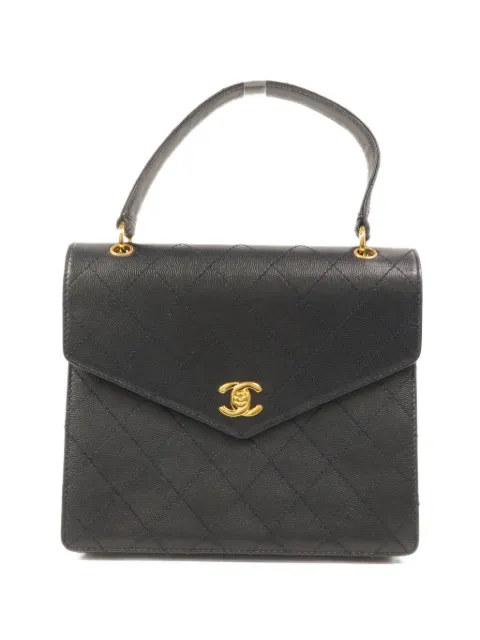 CHANEL Pre-Owned bolsa de mano con cierre giratorio y logo CC