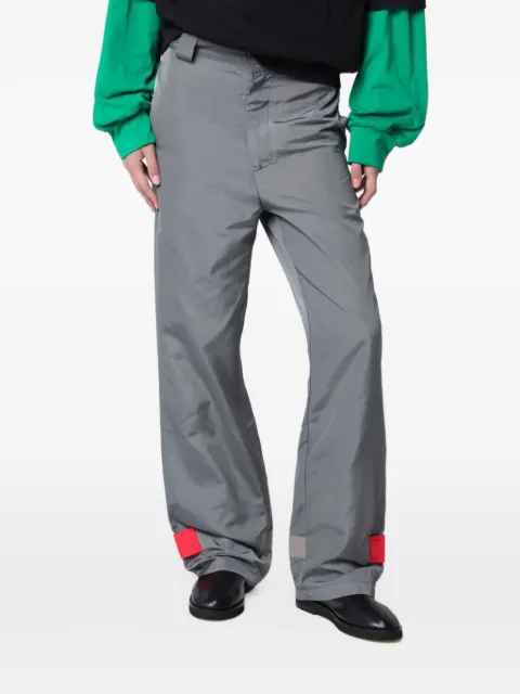 LII glossy strap-detail trousers