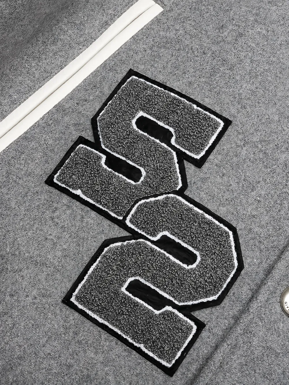 Givenchy patch-detail varsity bomber jacket Grijs