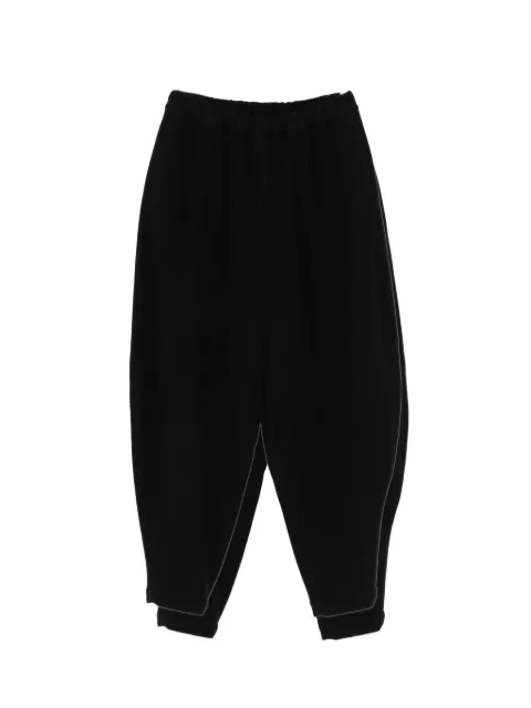 Black Comme Des Garçons elasticated-waist tapered trousers