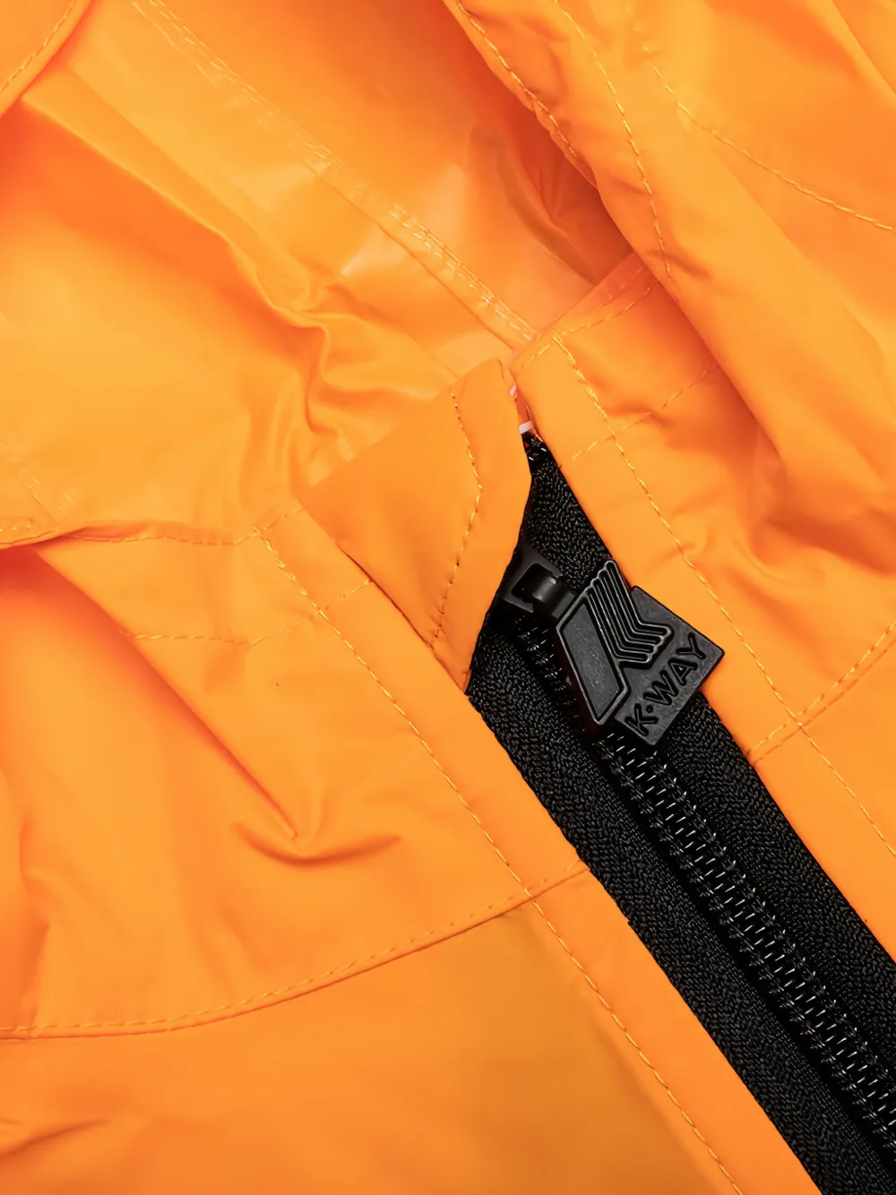 Comme Des Garçons Play Kids x K-Way heart-patch jacket Oranje