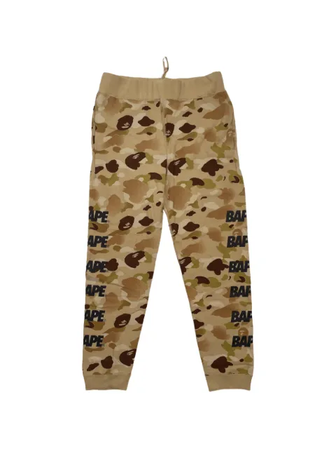 A BATHING APE® Ape Camo logo-print track pants